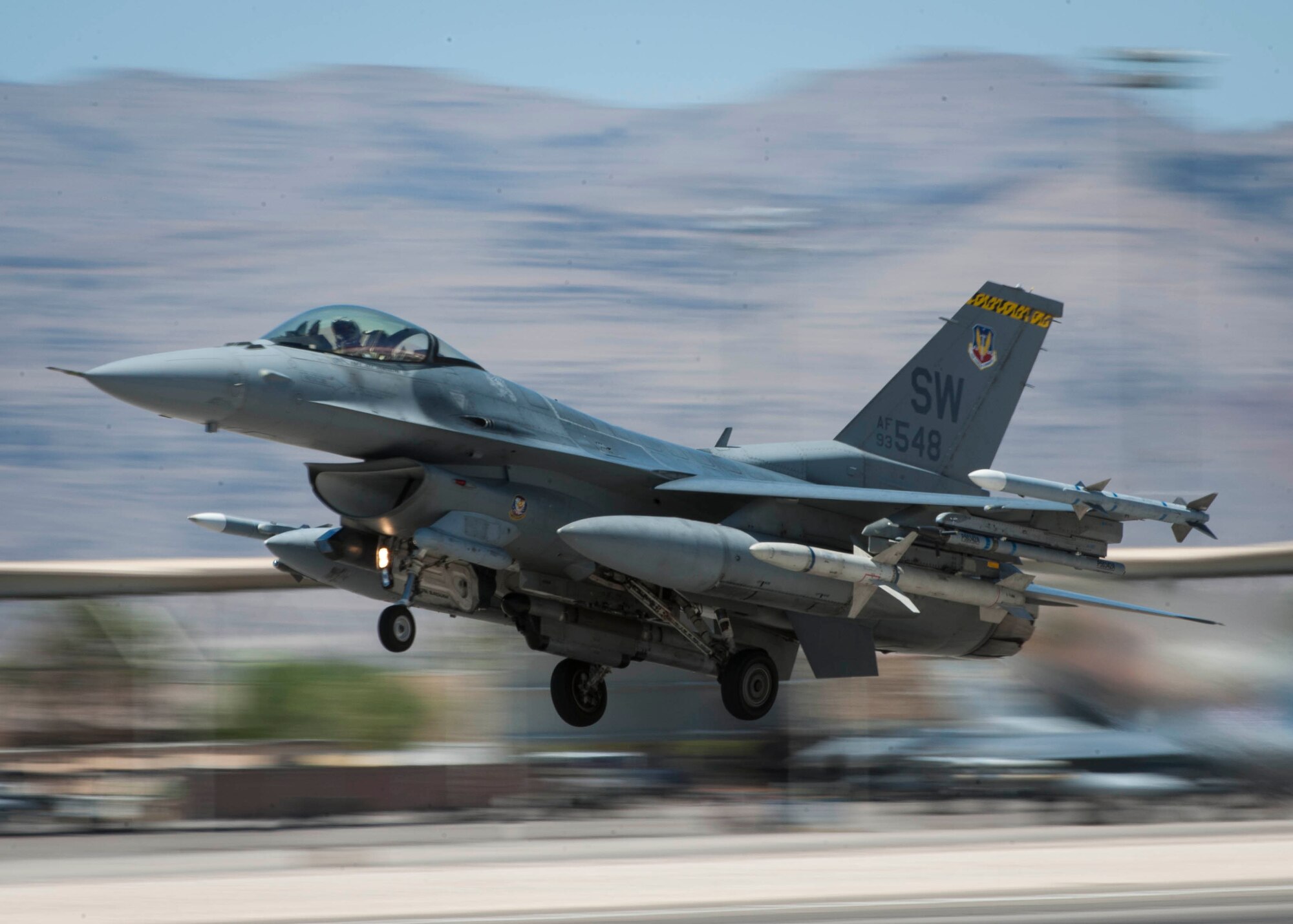 An F-16CJ from the 20th Fighter Wing, Shaw Air Force Base, S.C., takes off from the Nellis Air Force Base, Nev., flightline to participate in Red Flag 16-3, July 19, 2016. Red Flag, which is conducted by the 414th Combat Training Squadron at Nellis AFB, is a realistic combat training exercise involving the air forces of the U.S. and its allies that maximizes the combat readiness and survivability of participants by providing a realistic training environment. (U.S. Air Force photo by Senior Airman Jake Carter/Released)