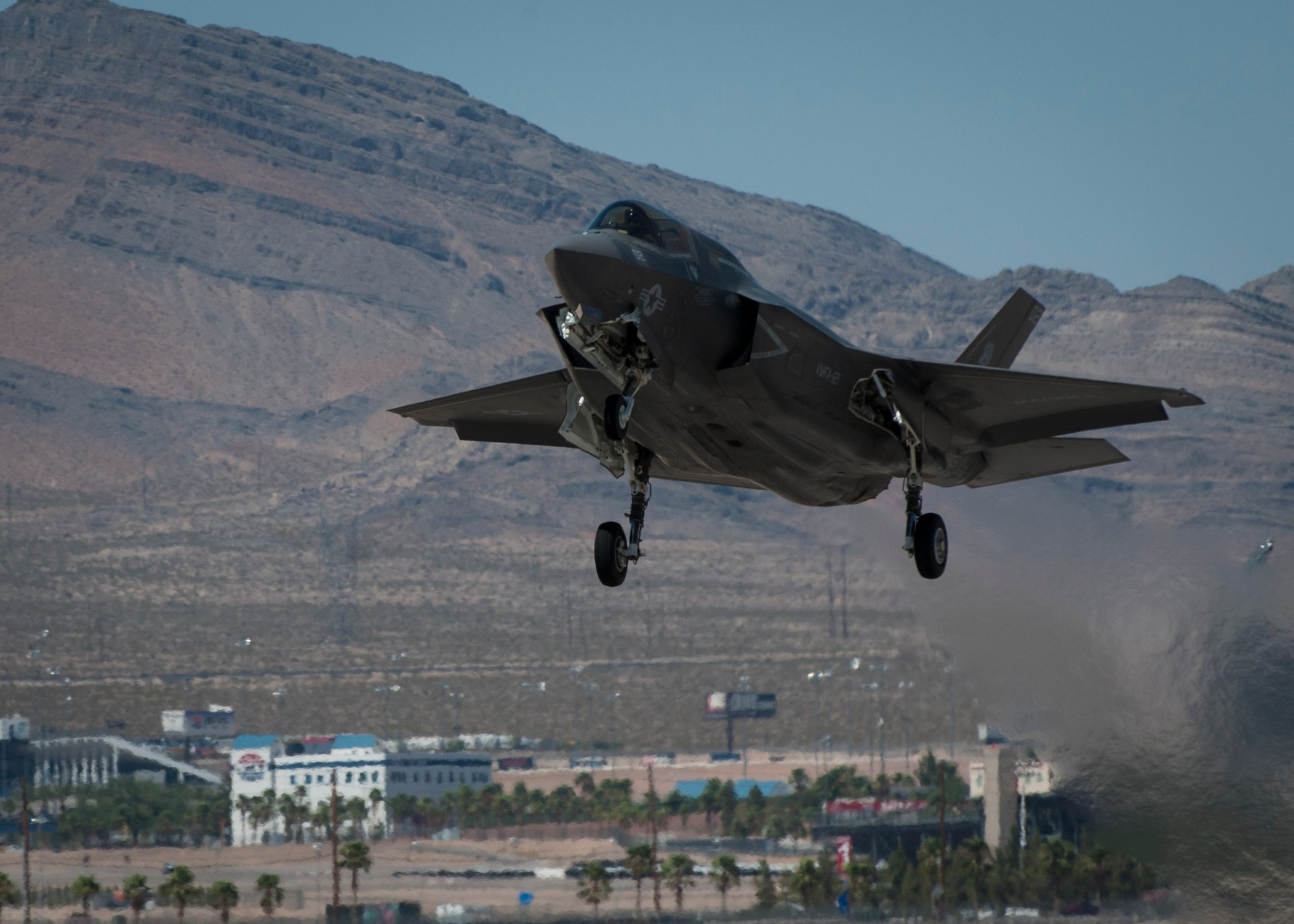 An F-35B from Marine Corps Air Station, Yuma, Ariz., takes off from the Nellis Air Force Base, Nev., flightline to participate in a training sortie during Red Flag 16-3, July 19, 2016. This is the first time an F-35 has participated in Red Flag as it works to be initial operational capable across all military platforms. (U.S. Air Force photo by Senior Airman Jake Carter/Released)