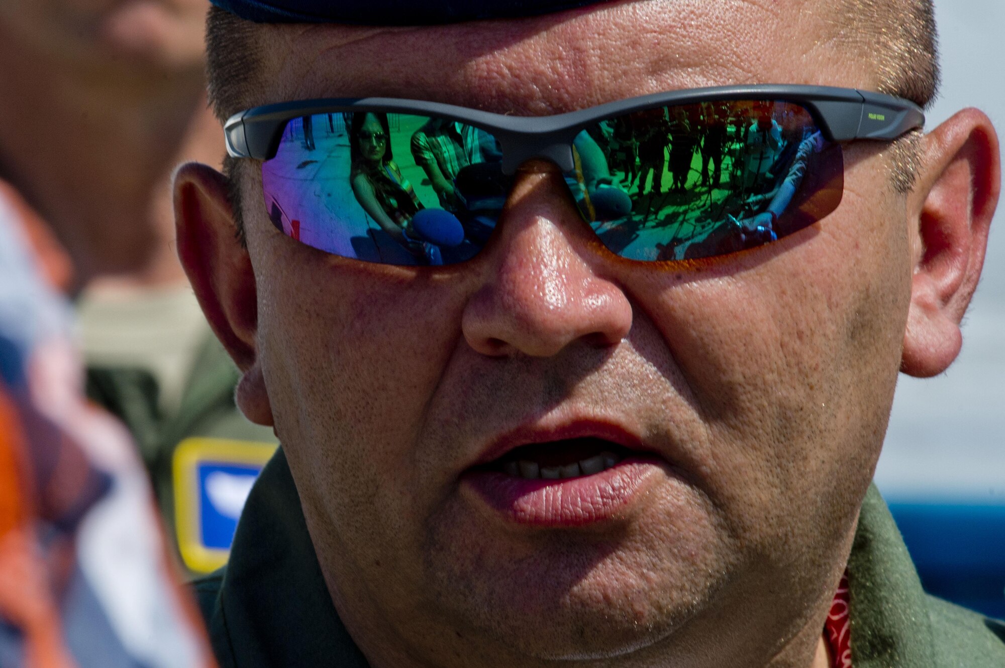 Romanian air force Col. Marius Oatu, 71st Air Base commander, answers reporters' questions during his base's air show and open house at Campia Turzii, Romania, July 23, 2016. The aviation demonstration took place during the middle of the U.S. Air Force's 194th Expeditionary Fighter Squadron's six-month long theater security package deployment to Europe in support of Operation Atlantic Resolve, which aims to bolster the U.S.'s continued commitment to the collective security of NATO and dedication to the enduring peace and stability in the region. The unit, comprised of more than 200 CANG Airmen from the 144th Fighter Wing at Fresno ANG Base, Calif., as well as U.S. Air Force Airmen from the 52nd Fighter Wing at Spangdahlem Air Base, Germany, piloted, maintained and supported the deployment of 12 F-15Cs Eagle fighter aircraft throughout nations like Romania, Iceland, the United Kingdom, the Netherlands, Estonia and among others. The F-15Cs took to the skies alongside the 71st AB's MiG-21 fighter aircraft and Puma helicopters for both the airshow, the second engagement of its kind at Campia Turzii under Operation Atlantic Resolve, and the bilateral flight training, also known as Dacian Eagle 2016. (U.S. Air Force photo by Staff Sgt. Joe W. McFadden/Released)