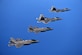 F-22 Raptors from the 94th Fighter Squadron, Joint Base Langley-Eustis, Va., and F-35A Lightning IIs from the 58th Fighter Squadron, Eglin Air Force Base, Fla., fly in formation after completing an integration training mission over the Eglin Training Range, Florida, Nov. 5, 2014. The purpose of the training was to improve integrated employment of fifth-generation assets and tactics. The F-35s and F-22s flew offensive counter air, defensive counter air and interdiction missions, maximizing effects by employing fifth-generation capabilities together. (U.S. Air Force photo/Master Sgt. Shane A. Cuomo)