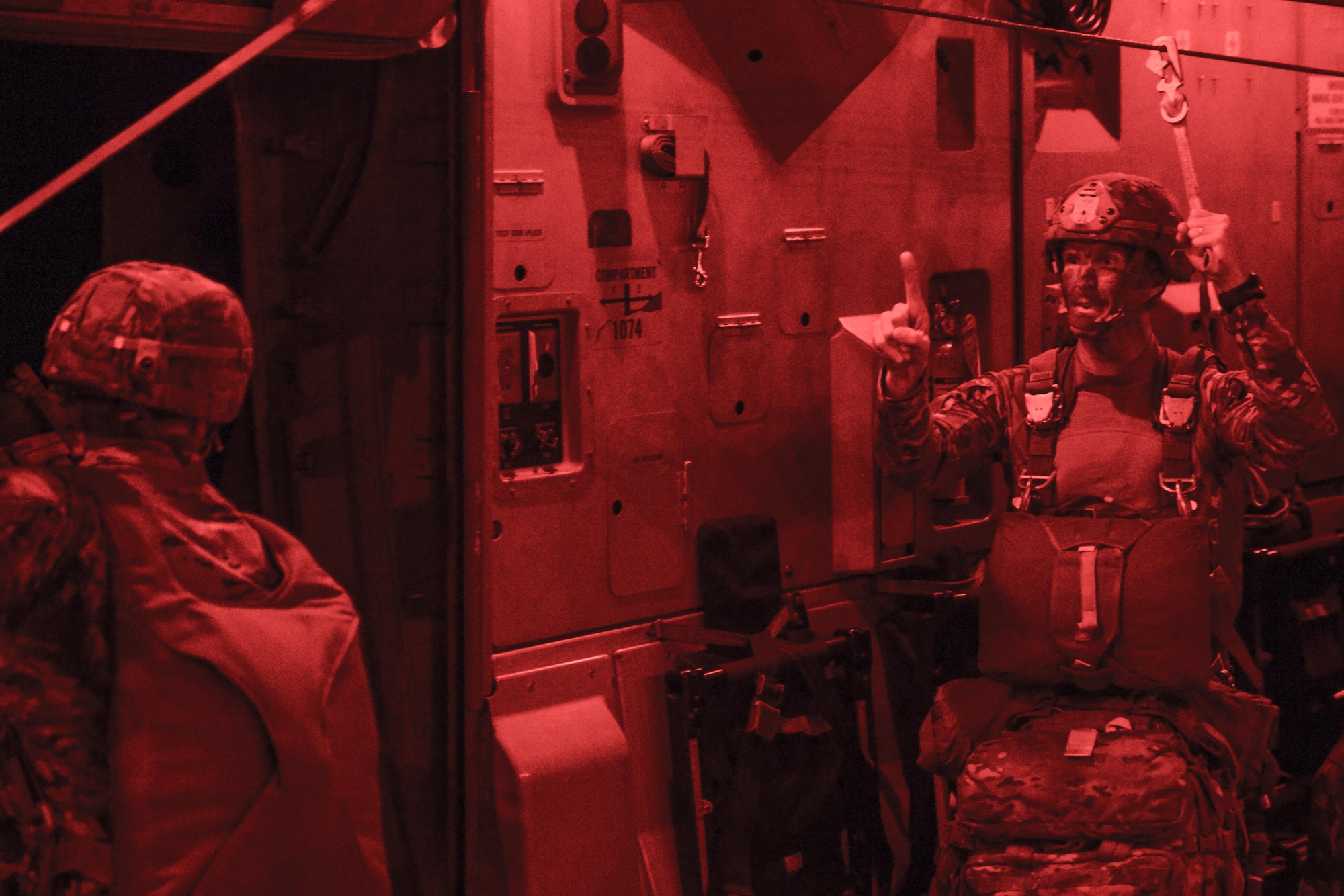 Maj. Gen. Richard D. Clarke, 82nd Airborne Division commanding general, prepares for a static-line jump from a C-17 Globemaster III July 17, 2016, over Polk Field, La. Clarke, along with more than 700 other paratroopers, teamed up with Mobility Air Forces Airmen to participate in Operation Devil Strike, a short-notice Emergency Deployment Readiness Exercise. (U.S. Air Force photo by Tech. Sgt. Sean Tobin.)
