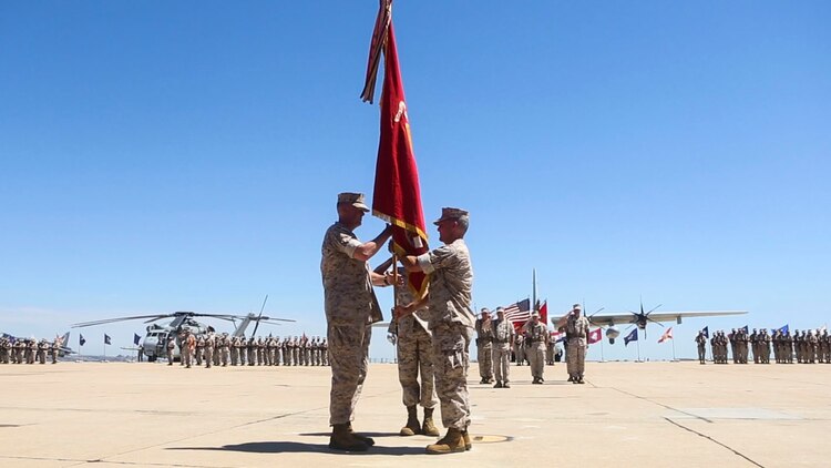 Maj. Gen. Mark Wise, left, incoming commanding general of 3rd Marine Aircraft Wing, receives the wing’s colors from Maj. Gen. Michael Rocco during a change of command ceremony aboard Marine Corps Air Station Miramar, Calif., July 22. Rocco relinquished command after serving as commanding general of 3rd MAW for approximately two years. (U.S. Marine Corps photo by Cpl. Kimberlyn Adams/Released)