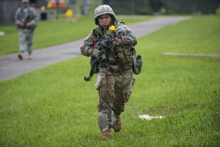 Cadets in Cadet Initial Entry Training at Fort Knox, Ky., use a three to five second rush to bound to their next position at the Hand Grenade Assault course July 22. (U.S. Army photo by Sgt. 1st Class Brian Hamilton/ released)