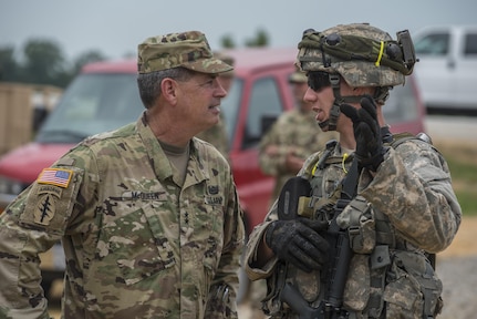 Maj. Gen. Mark McQueen, 108th Training Command (IET) commanding general, speaks to a Cadet in Cadet Basic Training at Fort Knox, Ky., aduring the Key Leader Engagment exercise July 22. The Reserve Officers' Training Corps' Cadet Summer Training Mission is supported by the 108th Training Command (IET) through its Task Force Wolf throughout the summer. (U.S. Army photo by Sgt. 1st Class Brian Hamilton/ released)