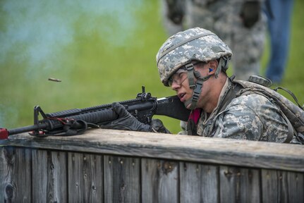 A Cadet in Cadet Initial Entry Training at Fort Knox, Ky., lays down supresive fire for his team mate at the Hand Grenade Assault course, July 22. (U.S. Army photo by Sgt. 1st Class Brian Hamilton/ released)