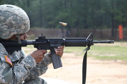 U.S. Army Spc. Zakia Gray, assigned to 982nd Combat Camera Company Airborne, conducts weapon qualifications with a M4 rifle during her Battle Training Assembly on Fort Bragg, NC July 16, 2016.  Weapons qualifcation is a mandatory training requirement that is part of the statutory obligation when assigned to the U.S. Army Reserves. (U.S. Army photo by Spc. Jesse Artis/Released)