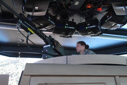 U.S. Army Spc. Madelyn, assigned to the 982nd Combat Camera, participates as a gunner during convoy training for annual training at Fort Bragg, NC on July 18, 2016. AT is a mandatory training requirement that is part of the statutory obligation when assigned to the U.S. Army Reserves. (U.S. Army photo by Spc. Lisa Velazco/Released)