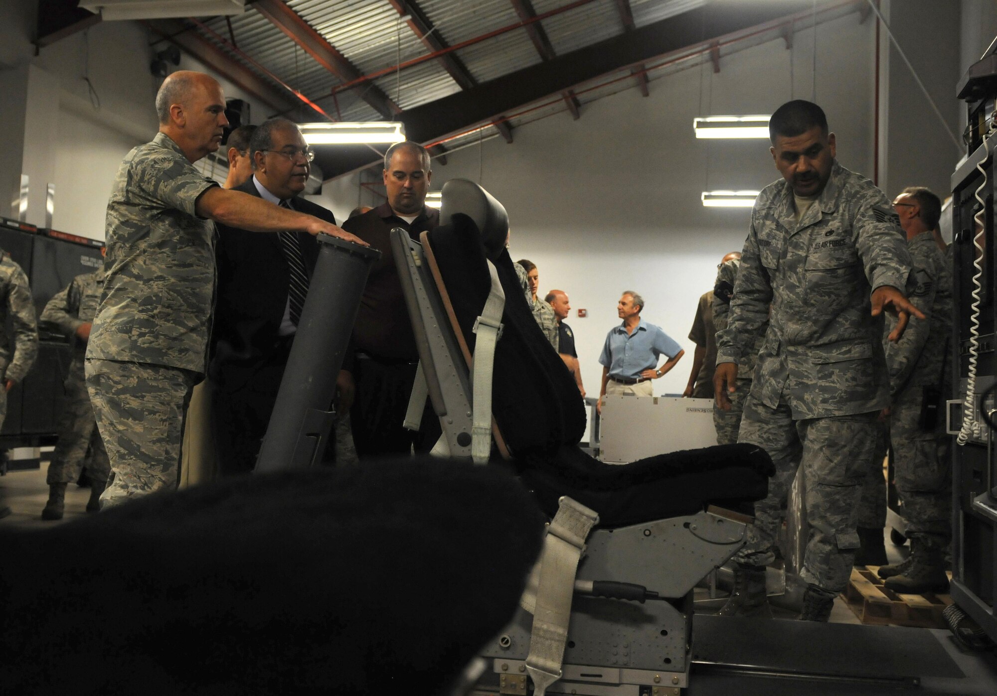 Tech. Sgt. Stephen Holtorf, 403rd Maintenance Squadron avionics technician, shows avionics equipment to Maj. Gen. T. Glenn Davis, mobilization assistant to the Air Force Material Command commander, July 21, 2016, on Keesler Air Force Base, Mississippi. Davis toured units within the 403rd MXS and also visited Airmen to discuss ways to improve the squadron. (U.S. Air Force photo/Senior Airman Holly Mansfield)

