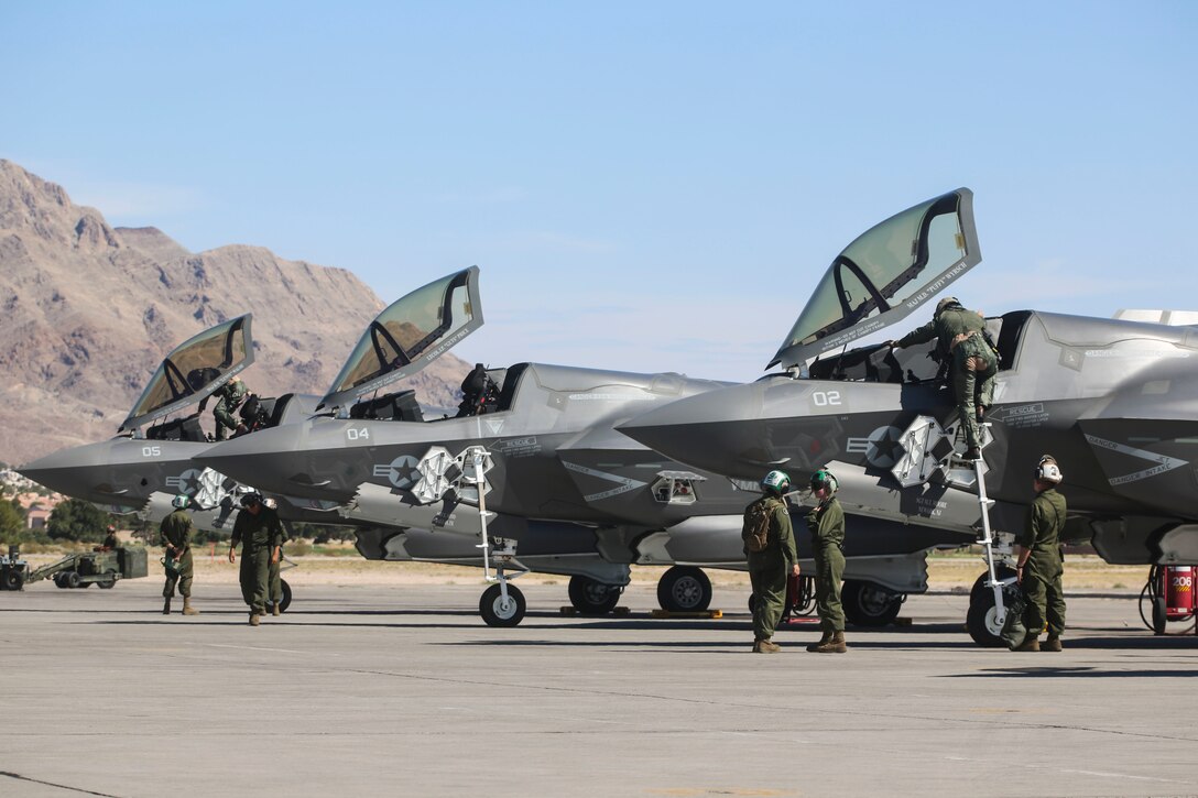 Pilots with Marine Fighter Attack Squadron (VMFA) 121 exit F-35B Lightning II’s after conducting training during exercise Red Flag 16-3 at Nellis Air Force Base, Nev., July 20. This is the first time that the fifth generation fighter has participated in the multiservice air-to-air combat training exercise. (U.S. Marine Corps photo by Lance Cpl. Harley Robinson/Released)