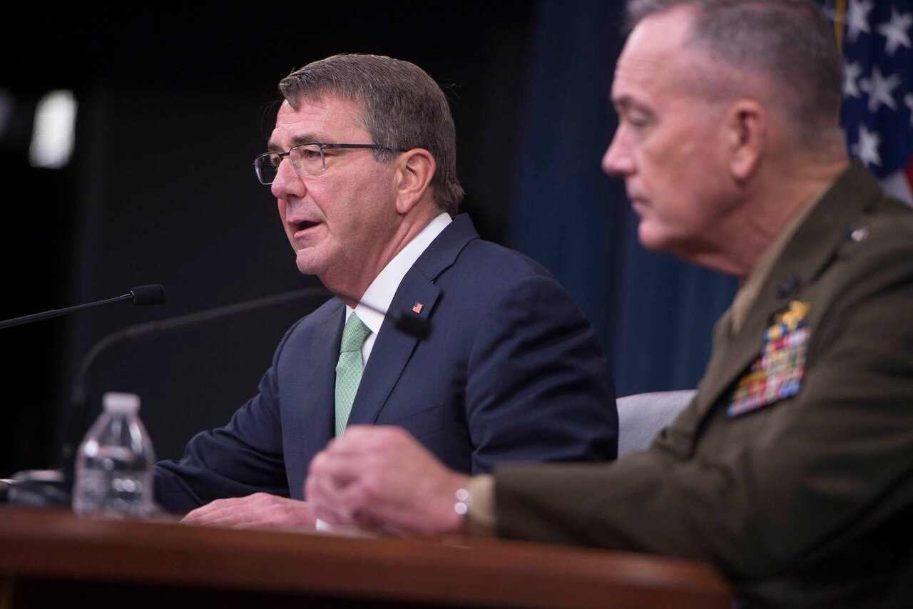 Defense Secretary Ash Carter, left, and Marine Corps Gen. Joe Dunford, chairman of the Joint Chiefs of Staff, speak with reporters at the Pentagon, July 25, 2016. DoD photo by Navy Petty Officer 1st Class Tim D. Godbee