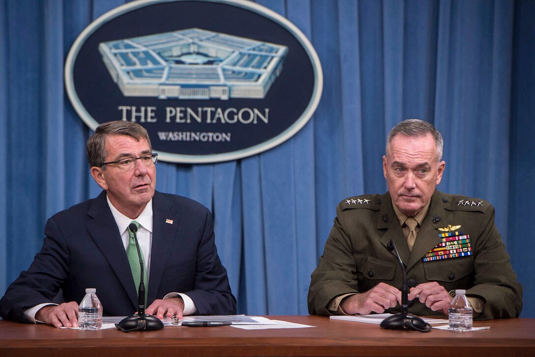 Defense Secretary Ash Carter, left, and Marine Corps Gen. Joe Dunford, chairman of the Joint Chiefs of Staff, speak with reporters at the Pentagon, July 25, 2016. DoD photo by Navy Petty Officer 1st Class Tim D. Godbee