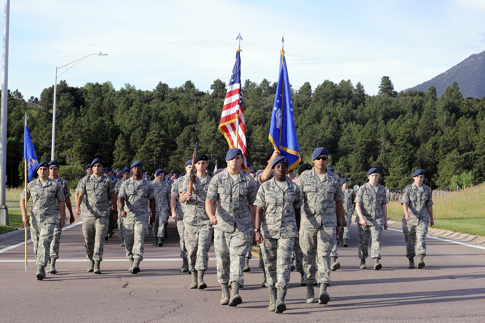 Cadet leadership lead cadet trainees on a 5-mile march to Jacks Valley, July 24, 2016, for the field training portion of Basic Cadet Training. Cadet trainees will spend 11 days going through several courses that will test their teamwork, mental fortitude and fears. 
