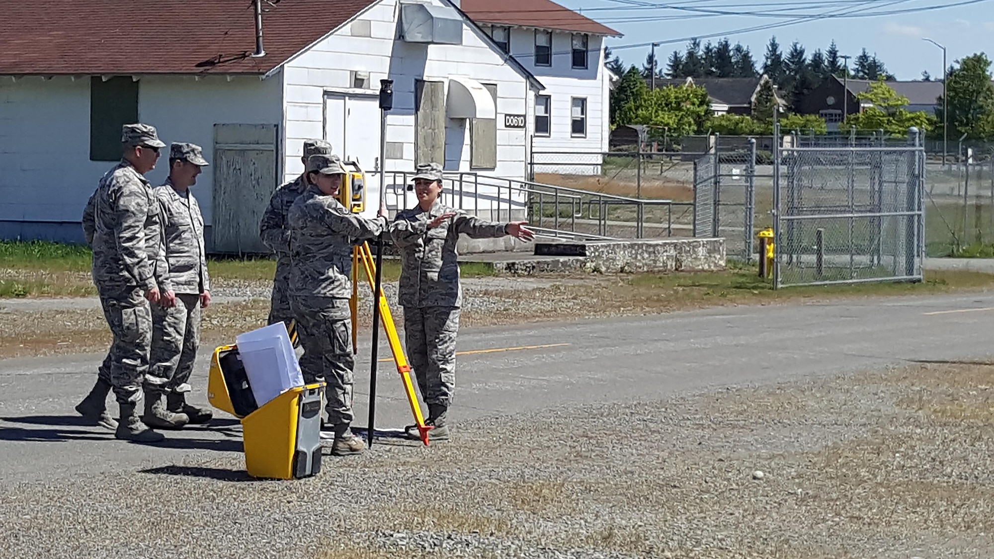 Air Force Reservists from the 446th Civil Engineer Squadron and Washington Air National Guardsmen from the 248th Civil Engineer Flight operate surveying equipment May 1, 2016, at Camp Murray, Wash. It was the first time Engineering Assistants from both units conducted training together. (Courtesy Photo)