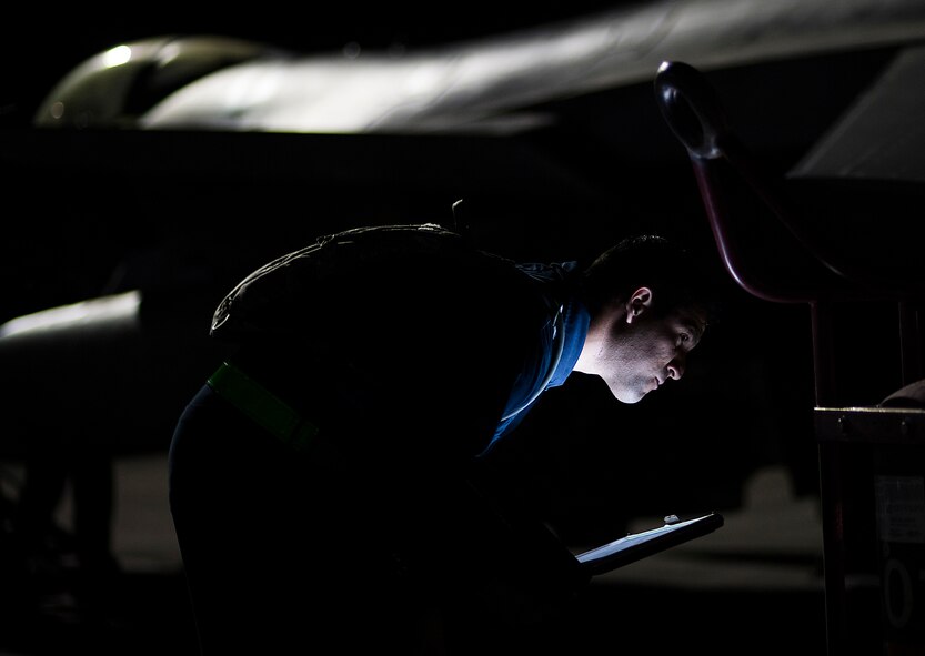 Staff Sgt. Erick Vega, an avionics specialist with the 555th Fighter Squadron out of Aviano Air Base, Italy, prepares his equipment and runs through checklist during exercise Red Flag July 21, 2016 at Nellis Air Force Base, Nevada. Minutes later, Vega would encounter a challenge to his space systems as a result of a test by the 527th Space Aggressors Squadron. (U.S. Air Force photo/Tech. Sgt. David Salanitri)