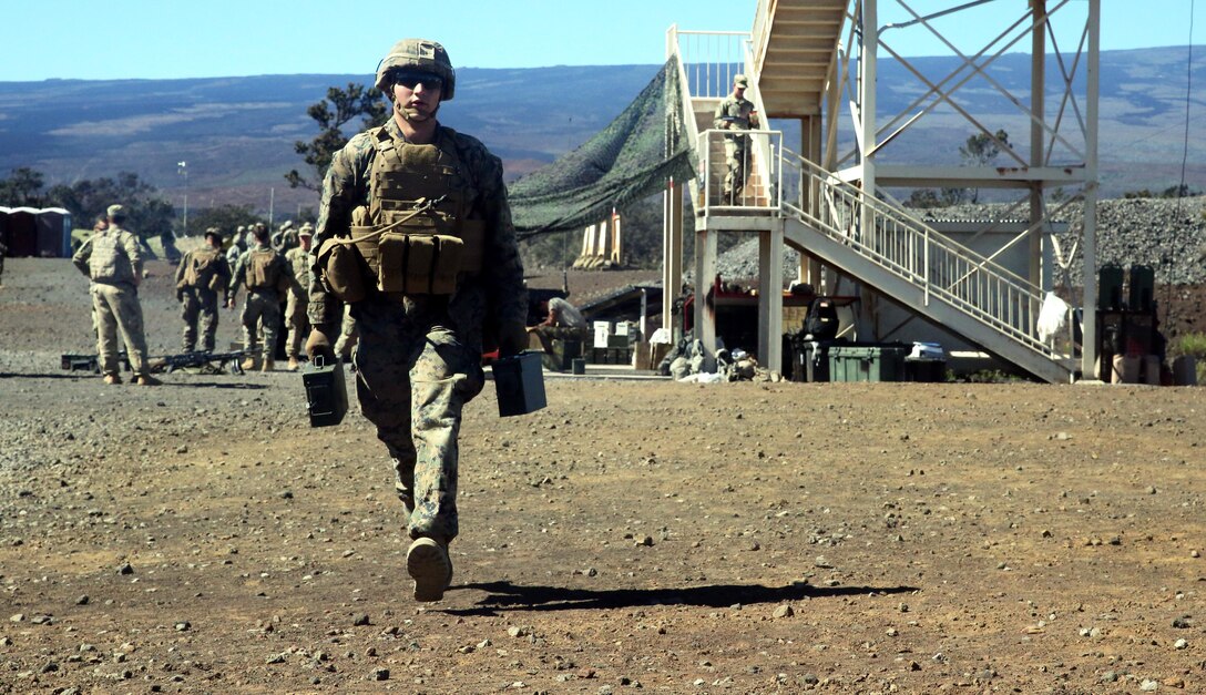Pfc. Jose Caraballo carries ammunition at Pohakuloa Training Area, Hawaii, July 14, 2016. The Marines are participating in Rim of the Pacific 2016, a multinational military exercise, from June 29 to Aug. 4 in and around the Hawaiian Islands. RIMPAC gives U.S. service members an opportunity to interact with partners and allies in the Pacific region. Caraballo, a native of Columbia Station, Ohio, is a machine gunner with Golf Company, 2nd Battalion, 3rd Marines, which supports III Marine Expeditionary Force. (U.S. Marine Corps Photo by Cpl. Natalie A. Dillon)