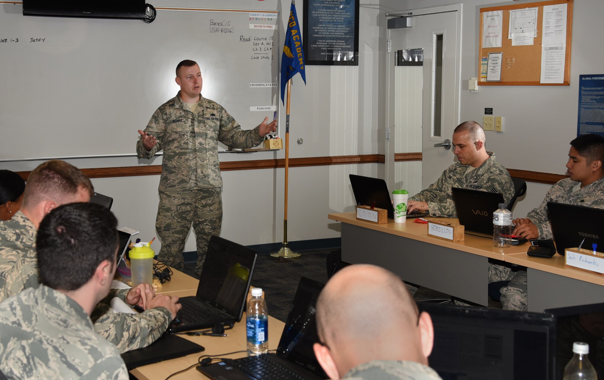 Tech. Sgt. Alex Elliott, Forrest L. Vosler Noncommissioned Officer Academy flight instructor, educates NCOs at Peterson Air Force Base, Colo., July 20, 2016. Elliott came into his current position in November 2014 through the Developmental Special Duty selection process. (U.S. Air Force photo by Airman 1st Class Dennis Hoffman)