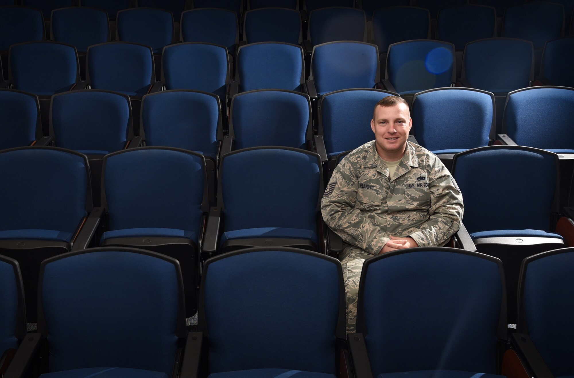 Tech. Sgt. Alex Elliott, Forrest L. Vosler Noncommissioned Officer Academy flight instructor, and his team of instructors graduate more than 90 NCOs at Peterson Air Force Base, Colo., July 20, 2016. Elliott was recognized as the NCO of the Quarter for both Team Pete and Air University during the first quarter of 2016. (U.S. Air Force photo by Airman 1st Class Dennis Hoffman)