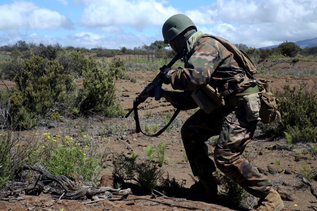 160716-M-ND832-015 POHAKULOA TRAINING AREA, Hawaii (July 16, 2016) – Pvt. Sami Mafileo participates in a live fire exercise at Pohakuloa Training Area, Hawaii, July 16, 2016. Members of His Majesty's Armed Forces of Tonga are participating in Rim of the Pacific 2016, a multinational military exercise, from June 29 to Aug. 4 in and around the Hawaiian Islands. RIMPAC offers the U.S. military the opportunity to train with partners and allies in the Pacific region. Mafileo, a native of Kolomotua, Tonga, is an infantryman with Tonga’s His Majesty’s Armed Forces Army. (U.S. Marine Corps Photo by Cpl. Natalie A. Dillon)