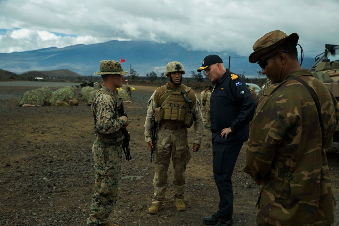 Royal New Zealand Navy Commodore Jim Gilmour visits Marines with III Marine Expeditionary Force while touring Pohakuloa Training Area, Hawaii, July 19, 2016, during Rim of the Pacific 2016. Rim of the Pacific 2016 is a multinational military exercise, from June 29 to Aug. 8, in and around the Hawaiian Islands.  Gilmour is the commander of Combined Task Force 176, a multinational naval force that includes military units from New Zealand, Australia, the U.S., and other allied and partnered nations. (U.S. Marine Corps Photo by Cpl. Isaac Ibarra)