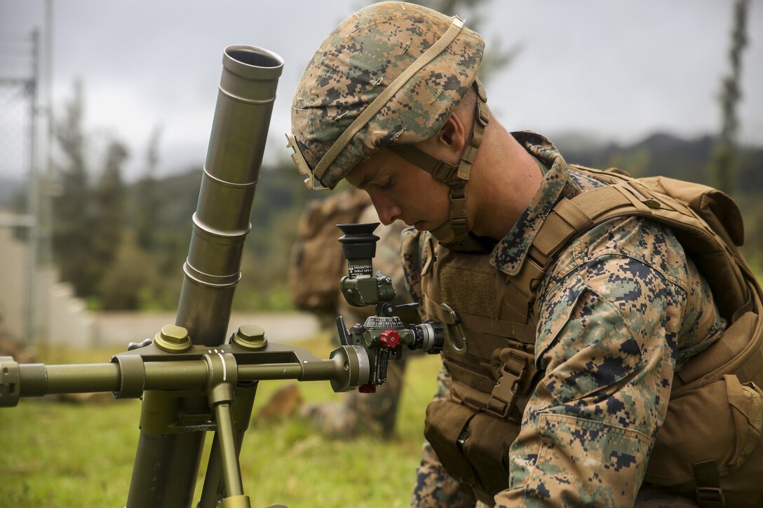 A U.S. Marine Mortarman of Golf Company, 2nd Battalion, 3rd Marines, makes adjustments to the mortar as coordinates are called out to him during Rim of the Pacific 2016. Twenty-six nations, 49 ships, six submarines, about 200 aircraft, and 25,000 personnel are participating in RIMPAC 16 from June 29 to Aug. 4 in and around the Hawaiian Islands and Southern California. The world’s largest international maritime exercise, RIMPAC provides a unique training opportunity while fostering and sustaining cooperative relationships between participants critical to ensuring the safety of sea lanes and security on the world’s oceans. RIMPAC 16 is the 25th exercise in the series that began in 1971.