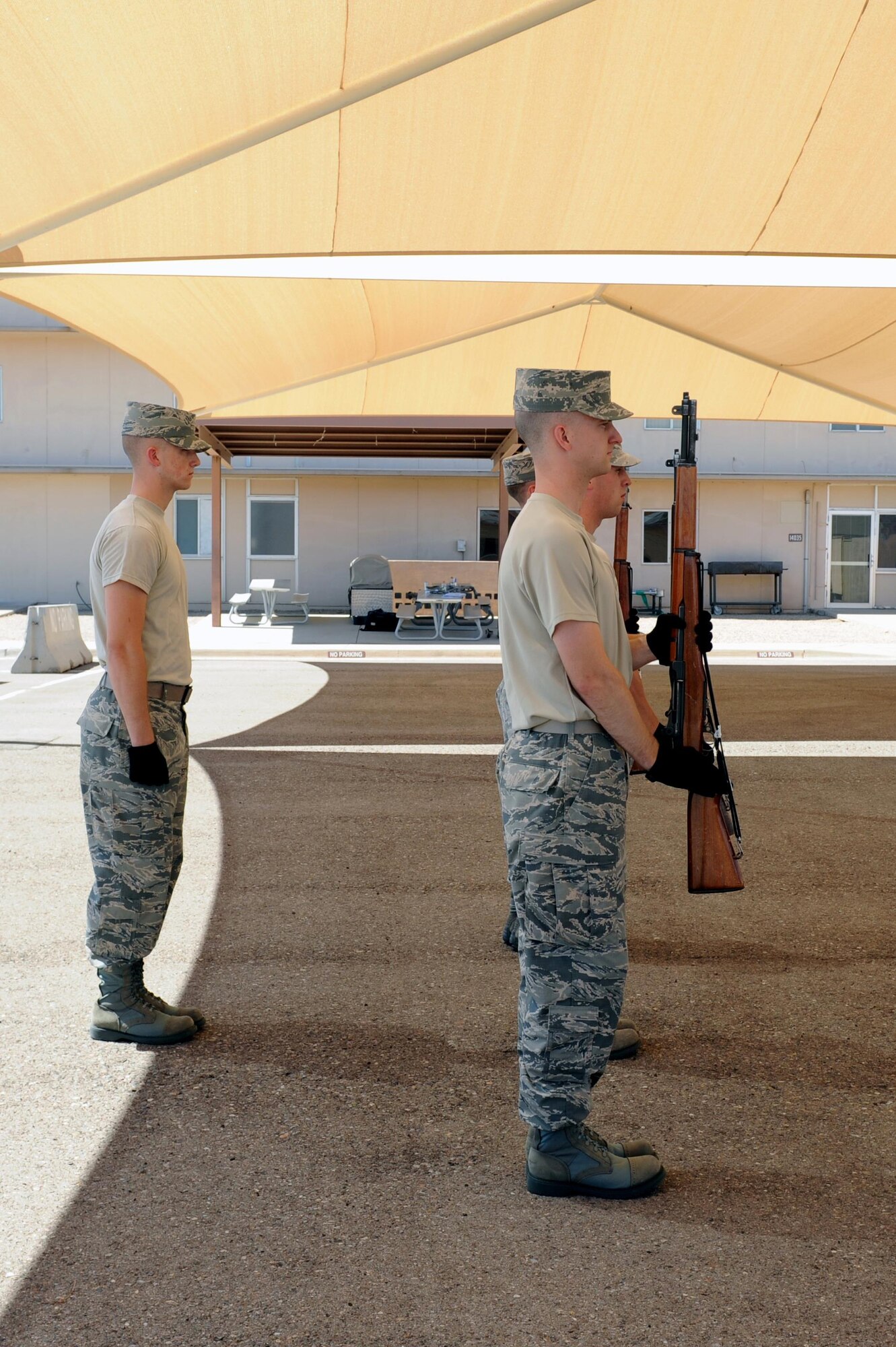 Airman 1st Class Matthew Green, , 56th Equipment Maintenance Squadron aerospace ground equipment apprentice, calls rife movement commands July 7, 2016 at Luke Air Force Base, Arizona. Rifle movements are used to present arms in firing party and the presentation of colors.