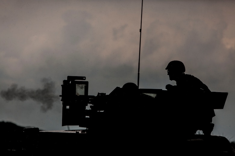 U.S. Marines with motor transportation company Marine Wing Support Squadron (MWSS) 171 stationed at Marine Corps Air Station Iwakuni, Japan, shoot an M240 bravo light-machine gun while conducting company level training during exercise Eagle Wrath 2016 at Combined Arms Training Center Camp Fuji, July 20, 2016. The squadron plans to complete their unit annual training requirements throughout three stages, which focus on air base ground defense and Marine Corps common skills that Marines are unable to train for locally. During this training the company commanders have the opportunity to train their personnel and prepare for the final culminating event where Marines will construct and defend a landing zone and refueling point. (U.S. Marine Corps photo by Lance Cpl. Aaron Henson)