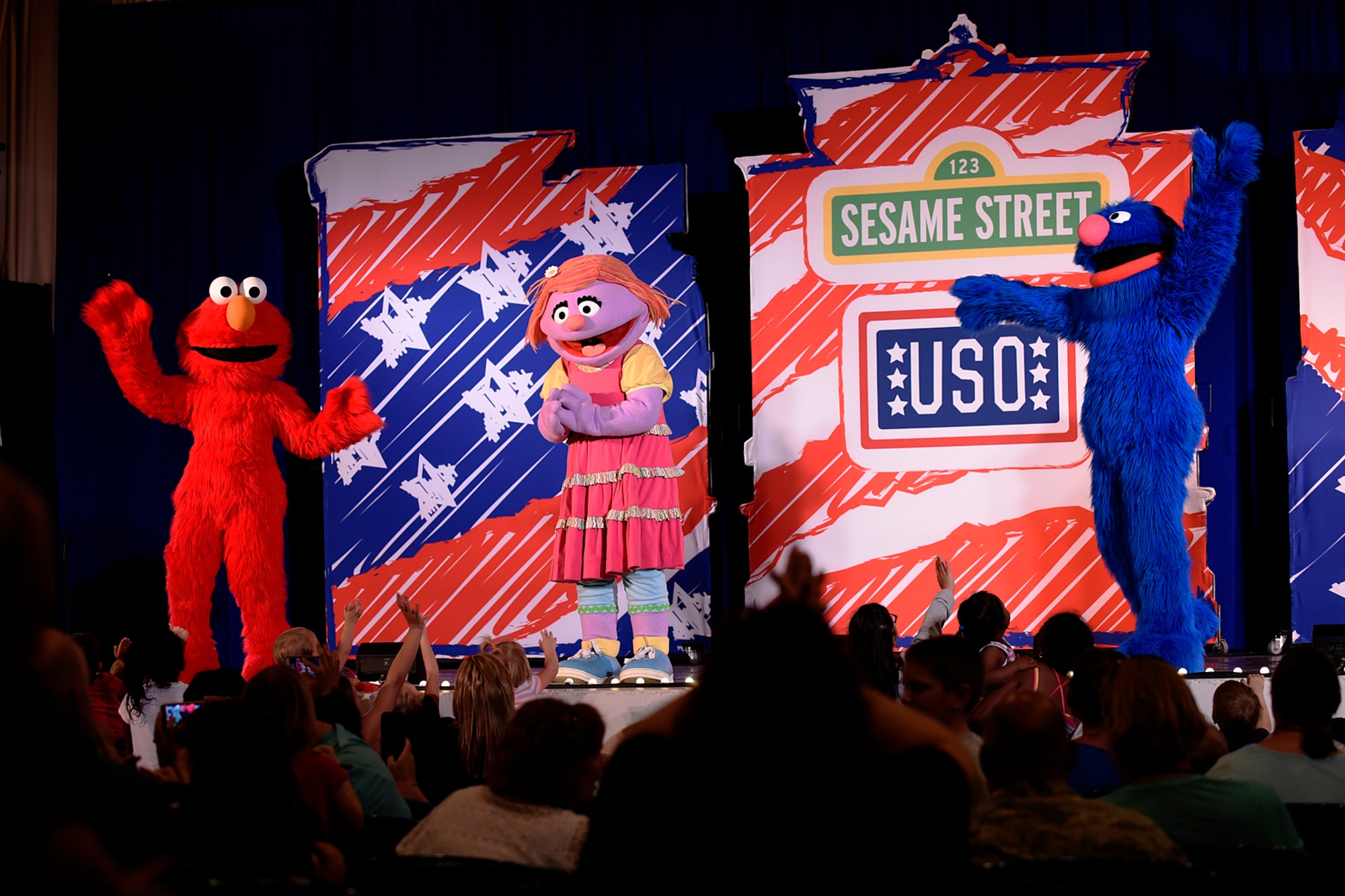PETERSON AIR FORCE BASE, Colo. – Sesame Street characters perform for Peterson families during the Sesame Street USO Experience at the base auditorium on Peterson Air Force Base, Colo., July 22, 2016. The show debuted in 2008 and has been performed at 149 military installations in 33 states and 11 countries, delivering a message of encouragement to military families. (U.S. Air Force photo by Senior Airman Rose Gudex)
