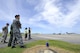 Japan Air Self Defense Force officers from Naha Air Base, Okinawa, observe the 18th Logistics Readiness Squadron fuels flight distribute to F-15 Eagles during their tour, July 21, 2016, at Kadena Air Base, Japan. The 18th LRS and JASDF officers toured the Kadena Petroleum, oils, and lubricants facilities, Fuel Service Center, and Distribution Management section while also observing hot pit refueling operations. (U.S. Air Force photo by Naoto Anazawa)