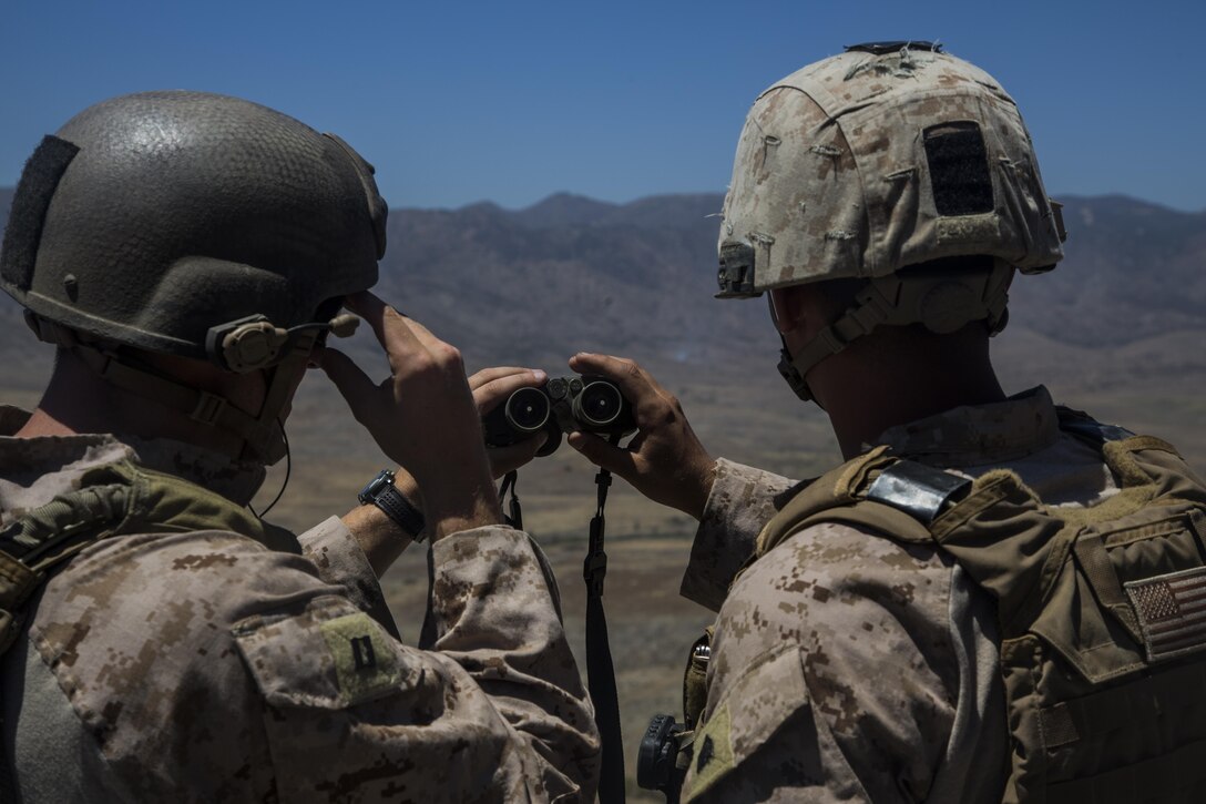 U.S. Marine Capt. Zachariah Riley, a fire power control team leader, and U.S. Marine Sgt. Joshua Dittman, a forward observer, choose a target for a close air support mission with the Canadian army and the Mexican navy during the Southern California portion of Rim of the Pacific 2016 training exercise aboard Marine Corps Base Camp Pendleton, Calif., July 13, 2016. The close air support missions help redefine and refine tactics in close air support and will also serve to assist the Mexican navy for laying the ground work and foundation for a structured tactical air control party school in the future. Units participating in the exercise were Marines with 1st Air Naval Gunfire Liaison Company, Canada’s 2e Battalion Royal 22e Régiment, and service members with the Mexican navy. Twenty-six nations, more than 40 ships and submarines, more than 200 aircraft and 25,000 personnel are participating in RIMPAC from June 30 to Aug. 4, in and around the Hawaiian Islands and Southern California. The world's largest international maritime exercise, RIMPAC provides a unique training opportunity that helps participants foster and sustain the cooperative relationships that are critical to ensuring the safety of sea lanes and security on the world's oceans. RIMPAC 2016 is the 25th exercise in the series that began in 1971.