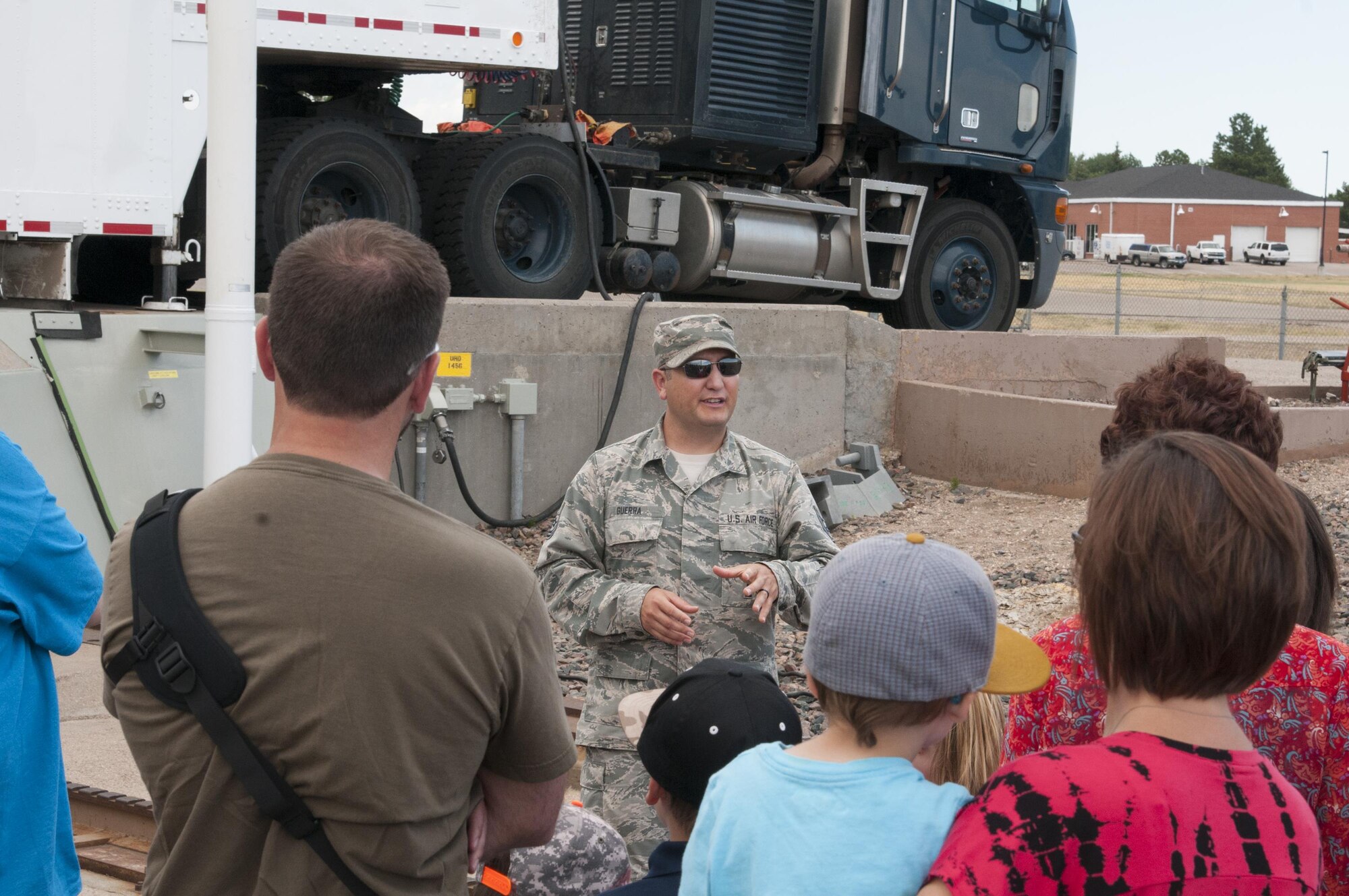 Tech. Sgt. Ruben Guerra, 90th Missile Maintenance Squadron NCO-in-charge of missile maintenance training, tells visitors about maintenance operations at a launch facilities July 24, 2016, during Fort D.A. Russell Days, the annual F.E. Warren Air Force Base, Wyo., open house. Guests to the open house toured a training lunch facility, the base museum and a missile launch control center trainer. (U.S. Air Force photo by Senior Airman Jason Wiese)