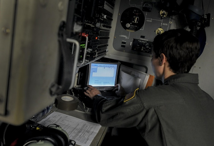 A Survival Evasion Resistance Escape Specialist, assigned to the 414th Combat Training Squadron, enters a C-17 before a training mission during Red Flag 16-3 at Nellis Air Force Base, Nev., July 20, 2016. Red Flag involves a variety of attack, fighter, bomber, reconnaissance, electronic warfare, airlift support, and search and rescue aircraft. (U.S. Air Force photo by Airman 1st Class Kevin Tanenbaum/Released)