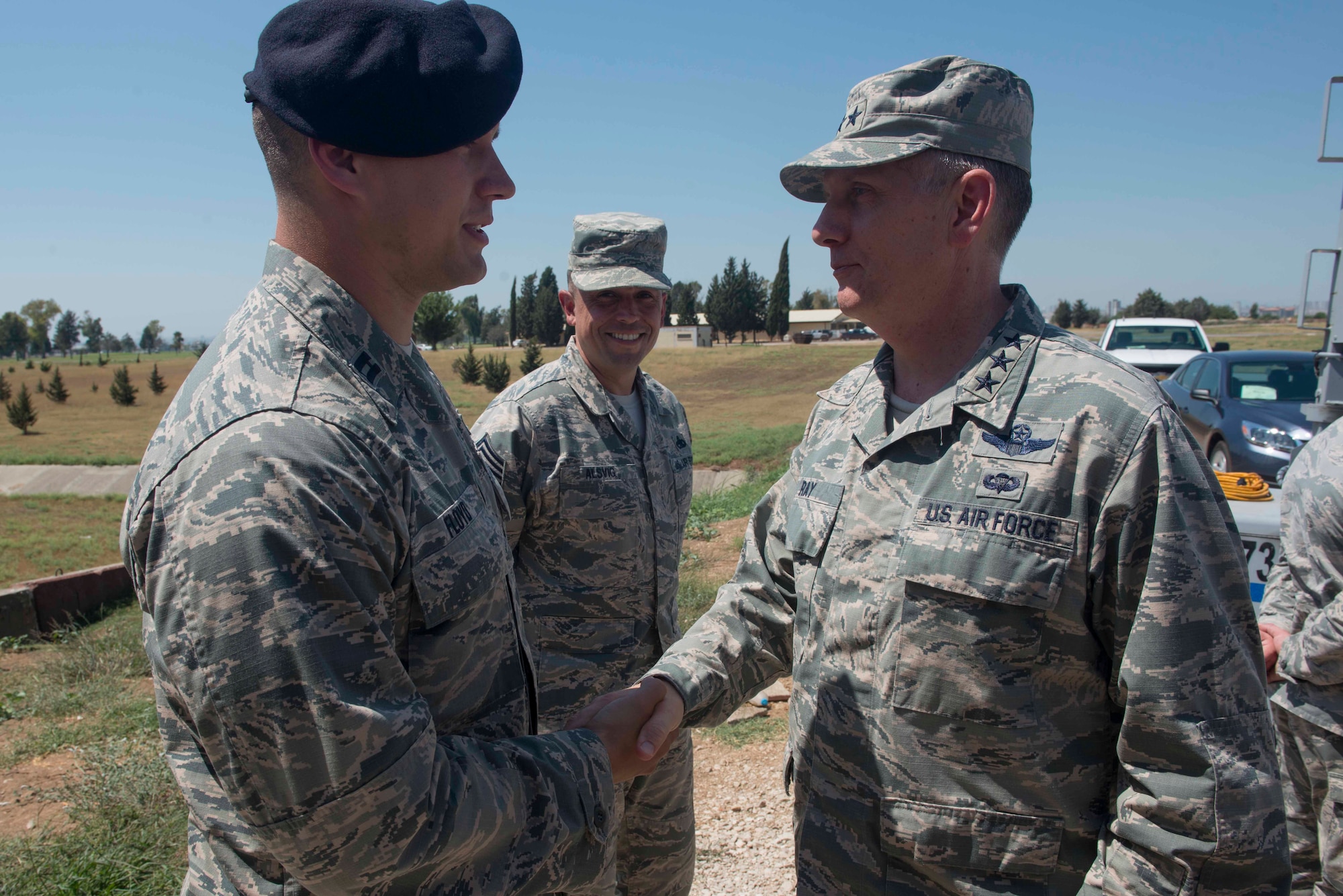 U.S. Air Force Lt. Gen. Timothy Ray, 3rd Air Force commander, coins Capt. Colton Floyd, 39th Security Forces Squadron director of operations, July 25, 2016, at Incirlik Air Base, Turkey. Ray met with 39th Air Base Wing Airmen to recognize them for their recent performance. (U.S. Air Force photo by Senior Airman John Nieves Camacho)