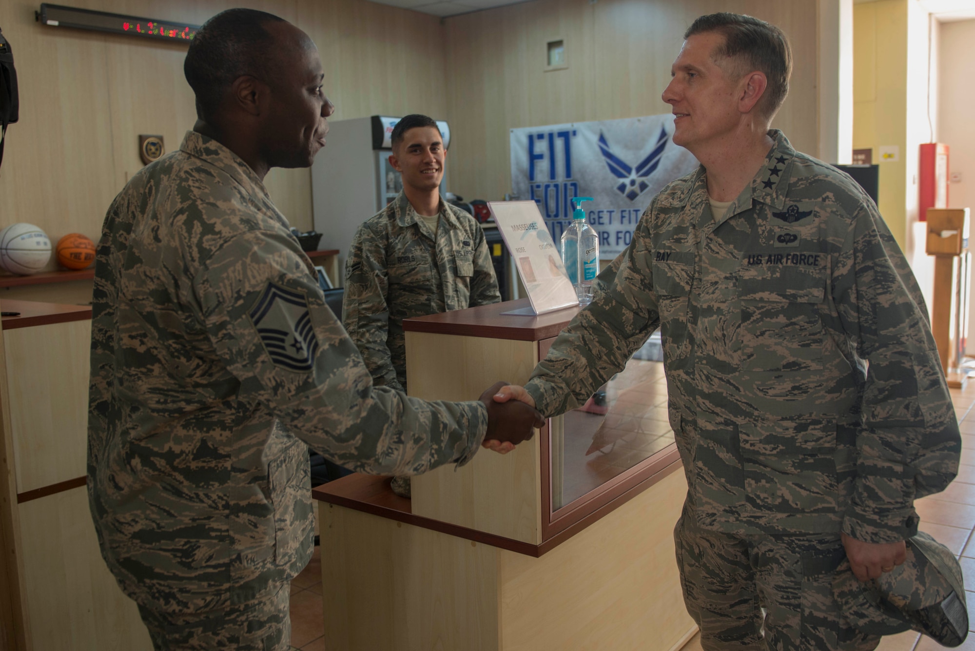U.S. Air Force Lt. Gen. Timothy Ray, 3rd Air Force commander, greets Senior Master Sgt. Brad Harewood, 39th Force Support Squadron sustainment flight superintendent, July 25, 2016, at Incirlik Air Base, Turkey. Ray visited multiple base facilities to recognize Airmen and see how they contribute to the mission. (U.S. Air Force photo by Senior Airman John Nieves Camacho)