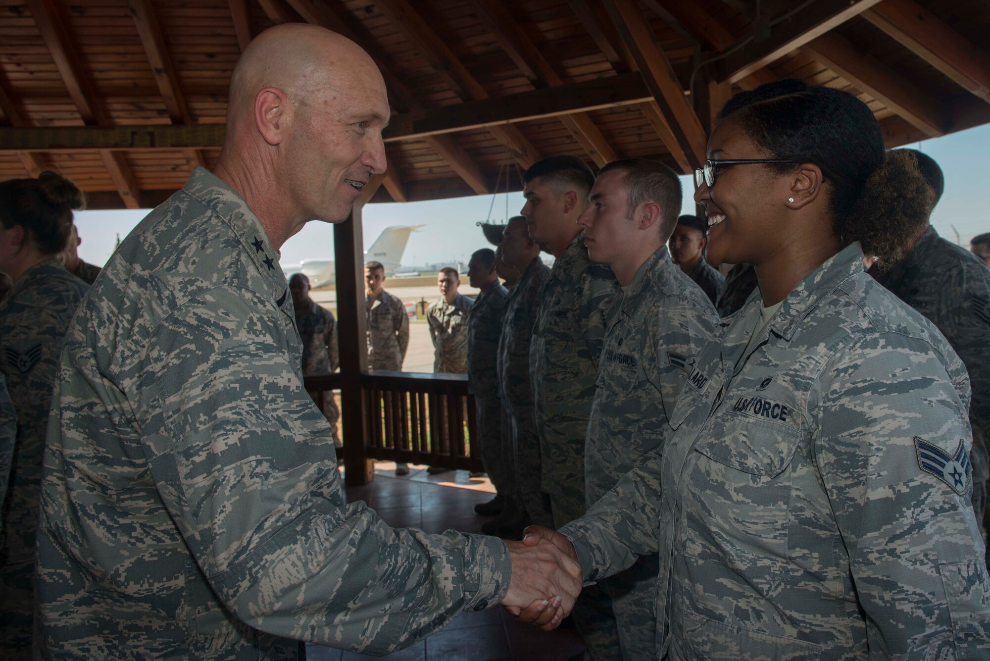U.S. Air Force Maj. Gen. Timothy Zadalis, U.S. Air Forces in Europe-Air Forces Africa vice commander, coins Senior Airman Brionna Gaillard, 39th Operations Support Squadron airfield management operations supervisor, July 25, 2016, at Incirlik Air Base, Turkey. Zadalis visited the installation to meet with Airmen, observe operating conditions and recognize Airmen for their recent accomplishments. (U.S. Air Force photo by Senior Airman John Nieves Camacho)