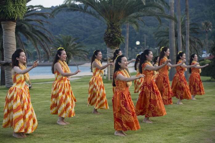 Hula dancers perform for the residents of Marine Corps Air Station Iwakuni and Oshima Islanders during the U.S. – Japan Luau Party on Oshima Island, Japan, July 23, 2016. Marines were able to experience a new part of Japan while celebrating the island’s history and friendship with U.S. (U.S. Marine Corps photo by Cpl. Nathan Wicks)