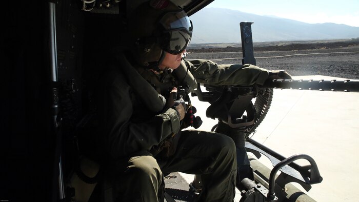 Cpl. Christopher Neumann prepares for takeoff in a UH-1Y Huey before a close air support exercise at Pohakuloa Training Area, Hawaii, July 19, 2016. Neumann is participating in Rim of the Pacific 2016, a multinational military exercise, from June 29 to Aug. 8 in and around the Hawaiian Islands. RIMPAC offers the U.S. military the opportunity to train with partners and allies in the Pacific region. Neumann, a native of Wells, Maine, is a UH-1Y Huey crew chief with Marine Light Attack Helicopter Squadron 367, which supports III Marine Expeditionary Force.