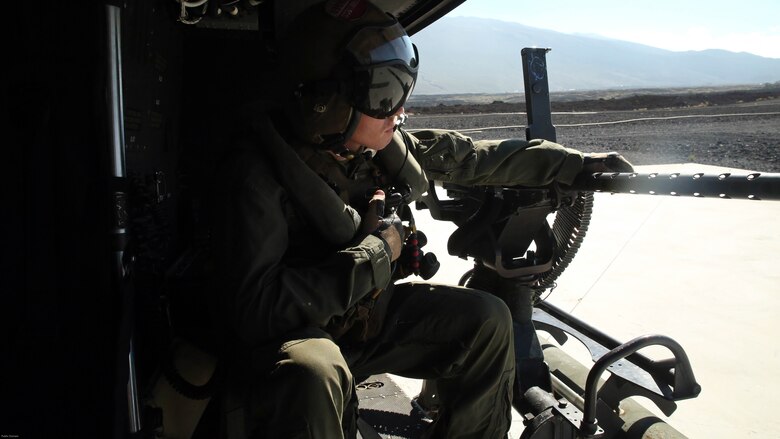 Cpl. Christopher Neumann prepares for takeoff in a UH-1Y Huey before a close air support exercise at Pohakuloa Training Area, Hawaii, July 19, 2016. Neumann is participating in Rim of the Pacific 2016, a multinational military exercise, from June 29 to Aug. 8 in and around the Hawaiian Islands. RIMPAC offers the U.S. military the opportunity to train with partners and allies in the Pacific region. Neumann, a native of Wells, Maine, is a UH-1Y Huey crew chief with Marine Light Attack Helicopter Squadron 367, which supports III Marine Expeditionary Force.