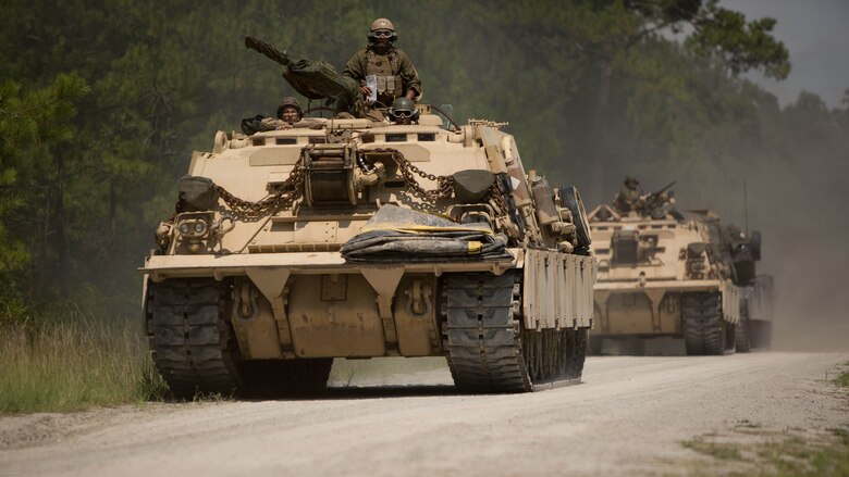 Marines with Fox Company, 4th Tank Battalion, drive to a landing zone to participate in an offensive and defensive exercise at Marine Corps Base Camp Lejeune, N.C., July 19, 2016. The M88A2 Hercules has the ability to tow tanks that weight up to 70 tons, making it the first choice to recover tanks from the battlefield. 