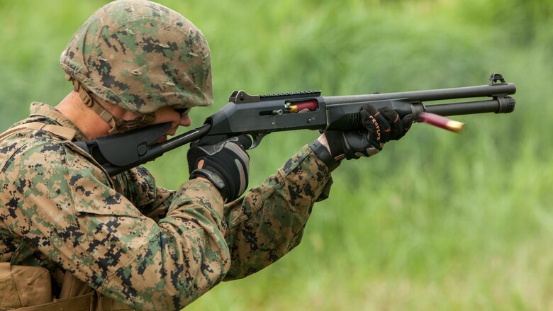 A U.S. Marine with combat engineer platoon, Marine Wing Support Squadron 171 stationed at Marine Corps Air Station Iwakuni, Japan, shoots a Benelli M4 Super 90 shotgun while conducting familiarization training during exercise Eagle Wrath 2016 at Combined Arms Training Center Camp Fuji, July 20, 2016. The squadron plans to complete their unit annual training requirements throughout three stages, which focus on air base ground defense and Marine Corps common skills that Marines are unable to train for locally. 