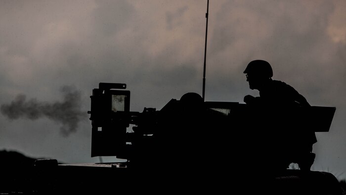 U.S. Marines with motor transportation company, Marine Wing Support Squadron 171 stationed at Marine Corps Air Station Iwakuni, Japan, shoot an M240 bravo light-machine gun while conducting company level training during exercise Eagle Wrath 2016 at Combined Arms Training Center Camp Fuji, July 20, 2016. The squadron plans to complete their unit annual training requirements throughout three stages, which focus on air base ground defense and Marine Corps common skills that Marines are unable to train for locally. During this training the company commanders have the opportunity to train their personnel and prepare for the final culminating event where Marines will construct and defend a landing zone and refueling point. 