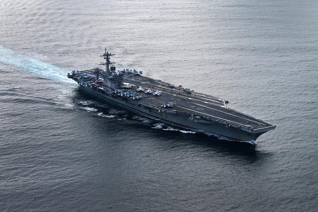 The aircraft carrier USS Carl Vinson transits the Pacific Ocean, July 17, 2016. The Vinson is underway with embarked Carrier Air Wing 2 and Destroyer Squadron 1 conducting the Tailored Ship's Training Availability and Final Evaluation Problem to prepare for their upcoming deployment. Navy photo by Petty Officer 3rd Class Sean M. Castellano