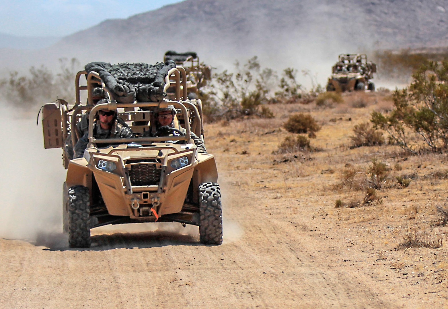 Paratroopers with the 82nd Airborne Division operate ultra-light combat vehicles during a training exercise at the National Training Center at Fort Irwin, California, Aug. 11, 2015. Defense Logistics Agency Troop Support’s Construction and Equipment supply chain will provide the vehicles to the 82nd Airborne’s Global Response Force. Photo by Army Staff Sgt. Jason Hull