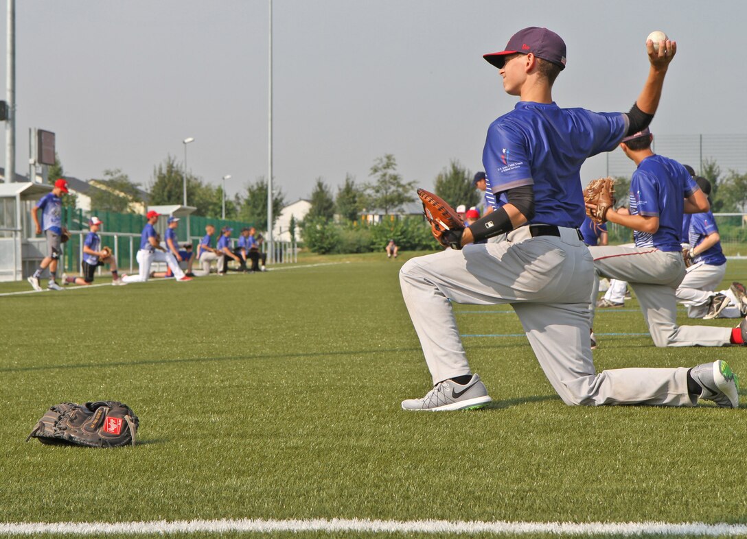Diamond's Elite baseball camp player warms up at U.S. Army Garrison Lucius D. Clay Kaserne in Weisbaden, Germany, July 22, 2016. The week-long camp, sponsored by Installation Management Command Europe, was held free of charge and brought together nearly 40 high school-aged students from DoDEA schools with a passion for baseball from seven U.S. Army Garrisons in Germany; one USAG in Brussels; and one USAG in Vicenza, Italy. (U.S. Army photo by Sarah Gross) 