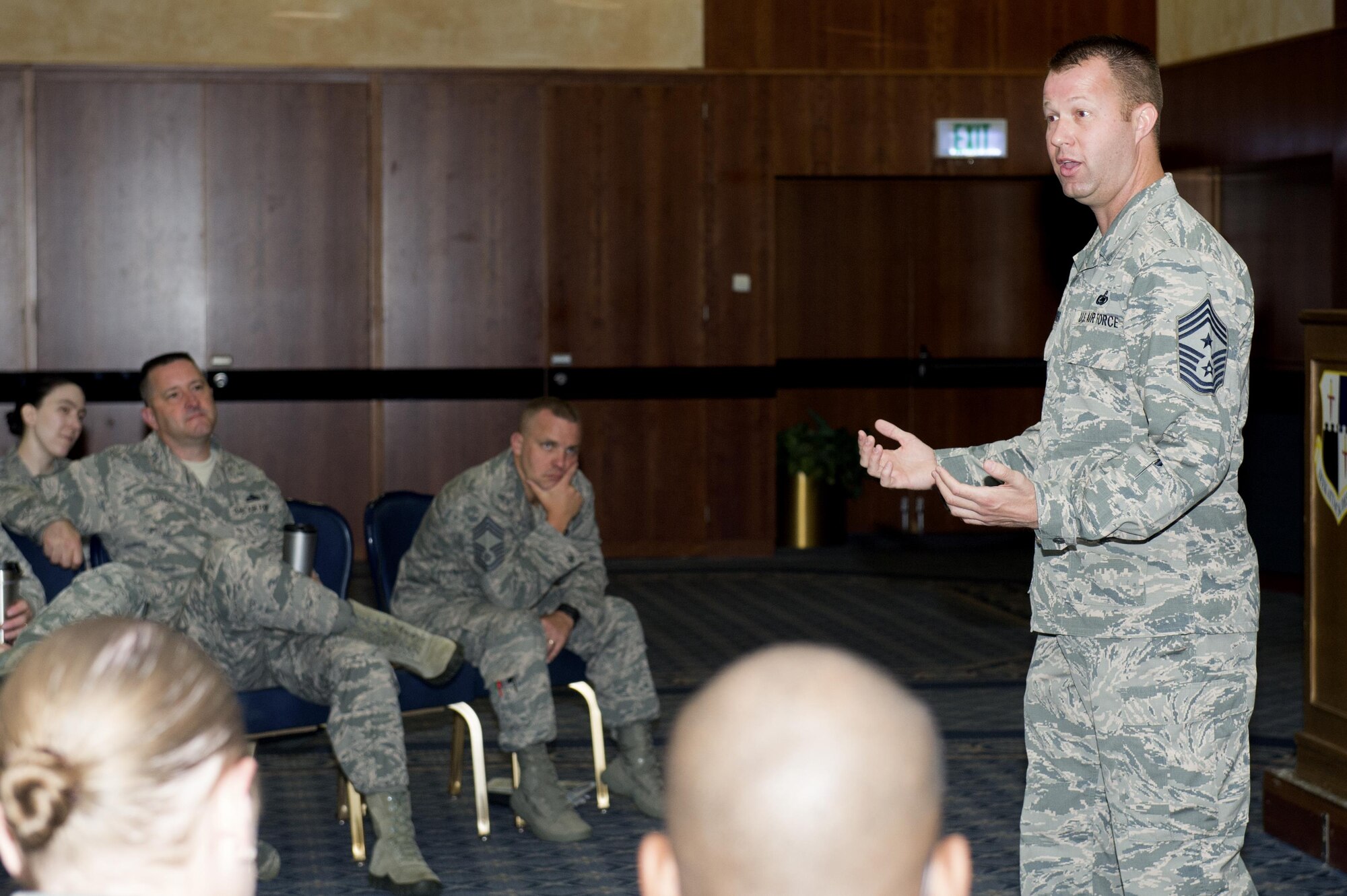 U.S. Air Force Chief Master Sgt. Edwin Ludwigsen, 52nd Fighter Wing command chief, speaks at his first senior NCO all call as command chief at Club Eifel on Spangdahlem Air Base, Germany, July 26, 2016. The command chief introduced himself and gave senior NCOs in attendance the chance to ask questions. (U.S. Air Force photo by Airman 1st Class Preston L. Cherry/Released)