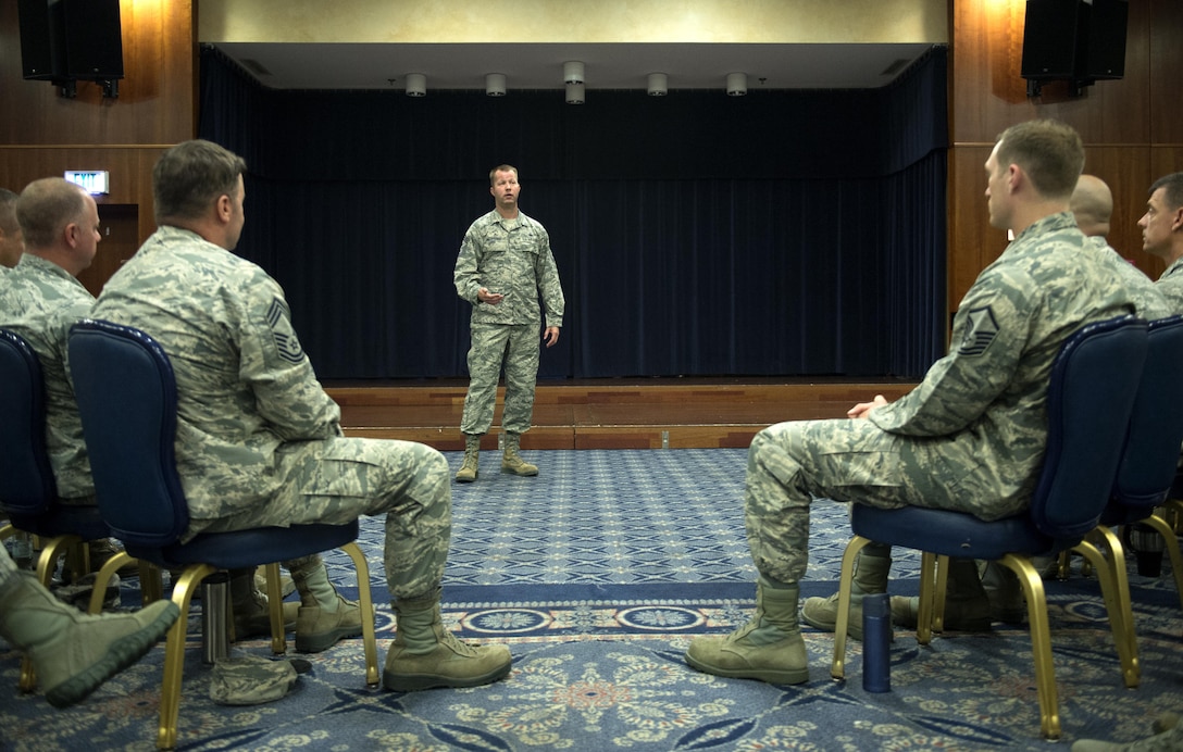 U.S. Air Force Chief Master Sgt. Edwin Ludwigsen, 52nd Fighter Wing command chief, speaks at a senior NCO all call at Spangdahlem Air Base, Germany, July 26, 2016. Ludwigsen spoke about his journey to becoming command chief and the expectations he had for the wing senior NCOs. (U.S. Air Force photo by Airman 1st Class Preston L. Cherry/Released)