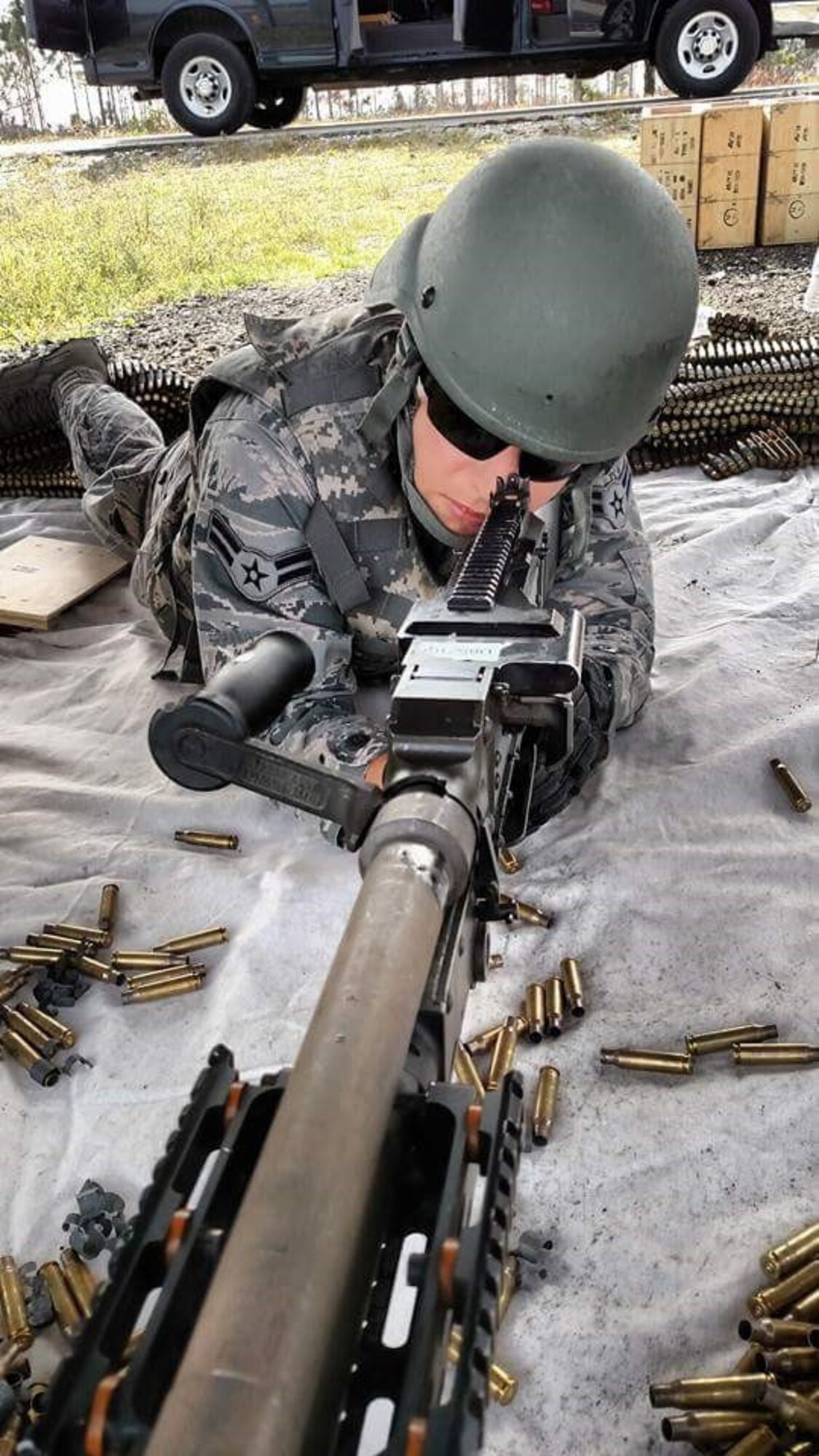 Airman 1st Class Alicia Powell, commercial search gate member assigned to the 6th Security Forces Squadron, aims at a target during Desert Defender deployment training at Fort Bliss, Texas. Powell attended the training in preparation for her first deployment.