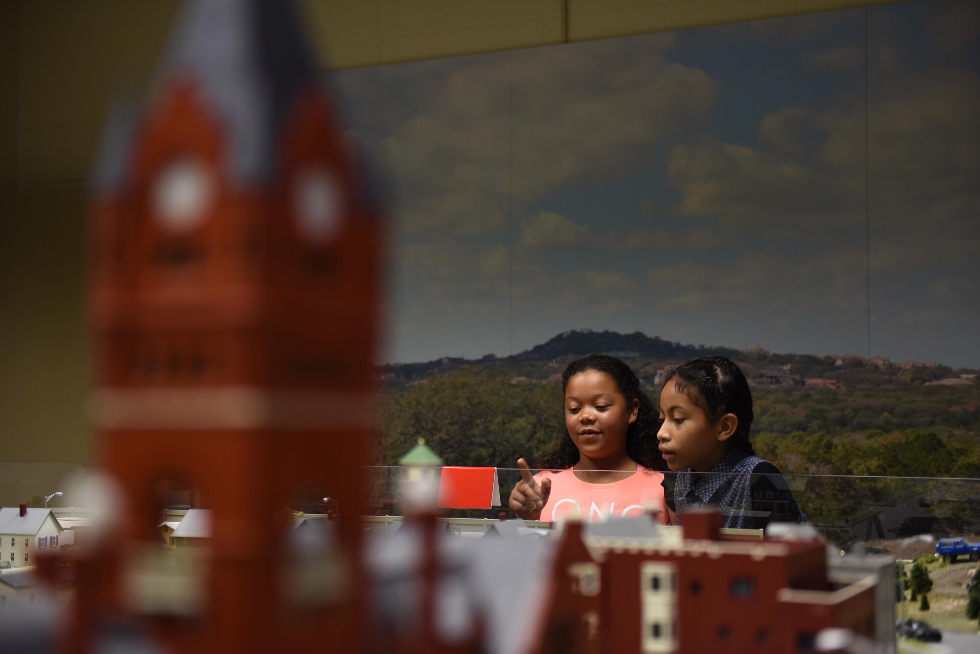 School-age children admire “Safety City,” a miniature version of San Angelo, during the Junior Firefighter Camp at the Louis F. Garland Department of Defense Fire Academy on Goodfellow Air Force Base, Texas, July 22, 2016. The participants toured the fire academy before their graduation ceremony for the camp. (U.S. Air Force photo by Airman 1st Class Caelynn Ferguson/Released)