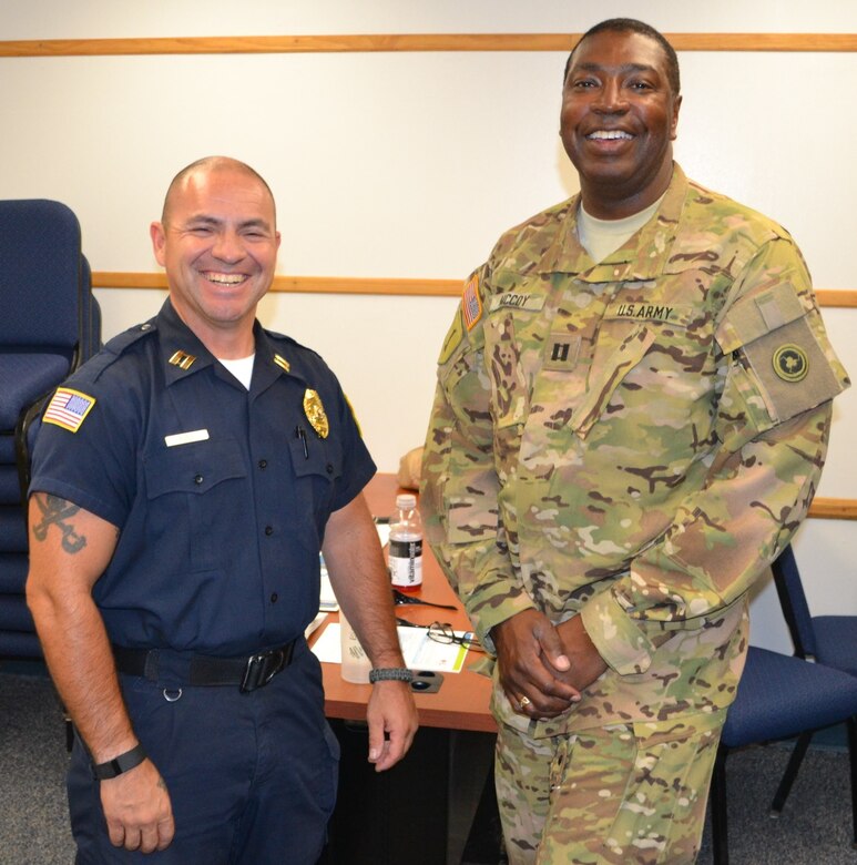 Capt. Monty McCoy, 650th Regional Support Group force protection officer, and Capt. Daniel Avila, Fort Irwin Guard Force Chief, worked together at the Fort Irwin National Training Center to undergo mandatory law enforcement training July 20. The Military Police remain the force of choice because of the combat force multiplier that they bring to the battlefield and their transition capability to Law and Order Operations.