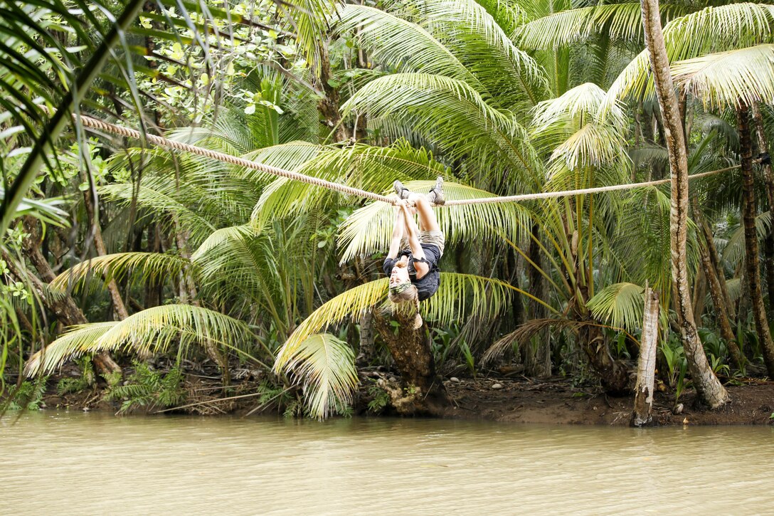 Kim Liszka, an emergency room nurse from Macungie, Pennsylvania, crosses a rope line while competing on the Discovery Channel survival competition series American Tarzan. Liszka,a former Army Reserve captain who served as a combat medic and flight nurse during her military career, is one of four competitors left standing on the show. The finale airs Wednesday, July 27 at 10/9 C on the Discovery Channel.