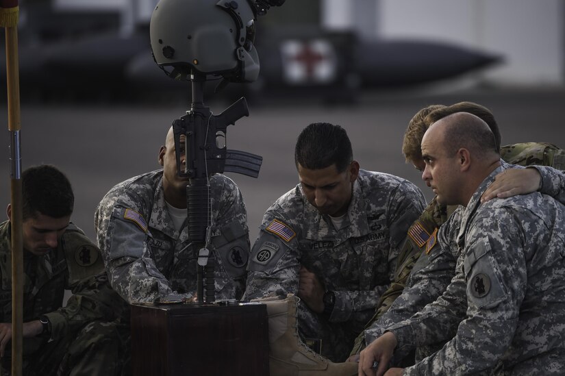 Members of the 1st Battalion, 228th Aviation Regiment pay their respects to U.S. Army Spc. Kyle Gantt during Gantt’s memorial service at Soto Cano Air Base, Honduras, July 24, 2016. Gantt, who was raised in Piqua, Ohio, enlisted in the Army in February 2012. (U.S. Air Force photo by Staff Sgt. Siuta B. Ika)